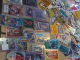 a table with a lot of pokemon cards on it