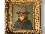 painting of a woman in a hat with flowers in a gold frame