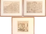 three framed maps of a city and a town in a wood frame