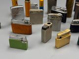 many different types of lighters on the table