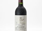 a bottle of wine that is sitting on a table