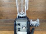 a blender that is sitting on a wooden table