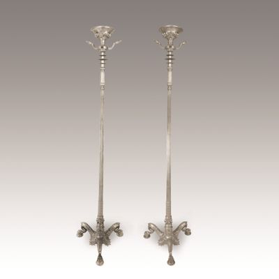 a pair of antique silver candlesticks