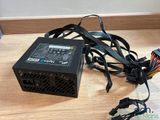 a close up of a computer power supply sitting on a table