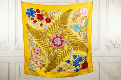 an image of a yellow scarf hanging on a clothes line