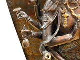 bronze statue of a woman holding a vase with a snake on it