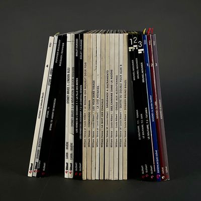 a stack of books sitting on top of each other on a table