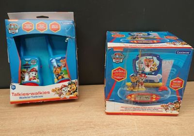 two toys that are sitting on a table next to each other