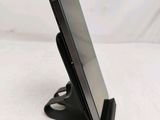 a cell phone that is sitting on a stand