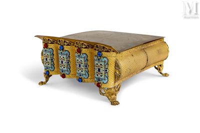 an image of a gold box with blue and red designs on it