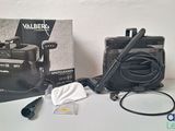 a camera and other items that are on a table