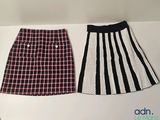 two skirts are lined up on a white surface