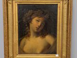 a painting of a woman with curly hair in a gold frame
