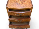 an image of a wooden chest of drawers with drawers on each side