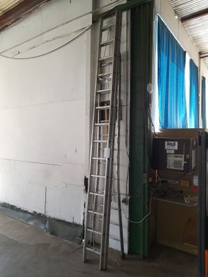a ladder leaning up against a wall in a building