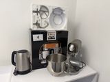 a coffee maker and a blender on a counter