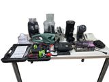 a table with a lot of electronics on it