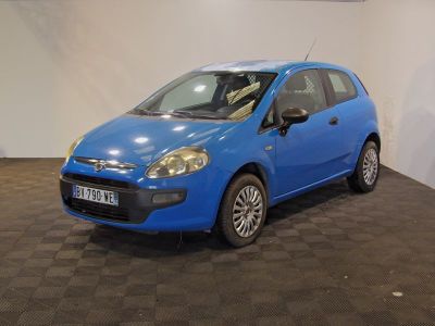 a picture of a blue car parked in a garage