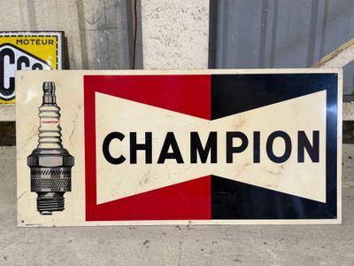 a sign that says champion on the side of a building