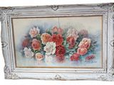tableau représentant un bouquet de fleurs dans un cadre blanc sur fond blanc