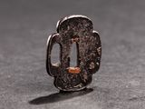 a small metal object that is sitting on a table