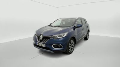 a blue renault suv parked in a white room