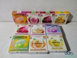 six cartons de boisson aux fruits « Waterdrop » posés sur une table blanche