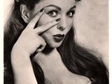 black and white photograph of a woman with long hair covering her eyes