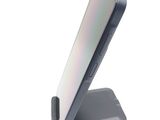 a phone that is sitting on top of a stand