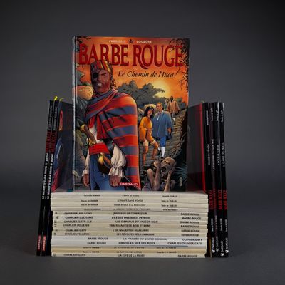 a stack of books with a picture of a man on it