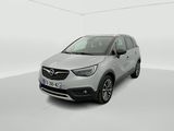 a silver car is parked in a white room with a white floor
