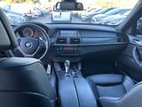 a view of the inside of a car from the driver ' s seat
