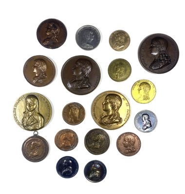 a lot of coins that are on a white surface