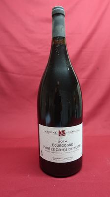 a bottle of wine that is sitting on a table