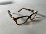 glasses on a table with a white table cloth and a white background