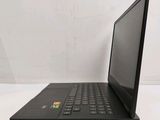 a close up of a laptop computer sitting on top of a white table