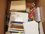 a box full of school supplies that are in the box