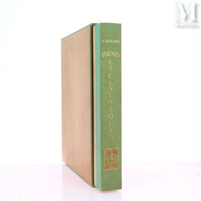 a green book sitting on top of a white table