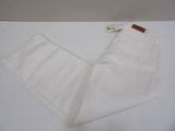 the pants are white and have a brown label on them
