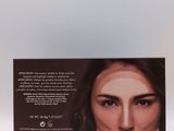 a close up of a box of makeup with a woman ' s face on it