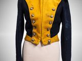 a yellow and black jacket on a mannequin mannequin mannequin mannequin mannequin mannequin mannequin mannequin mann