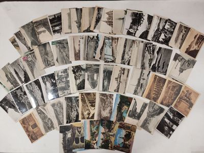 a lot of old black and white photos on the wall