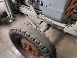a tractor that is parked in a garage