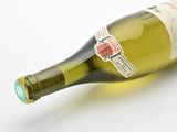 a bottle of wine that is sitting on a table