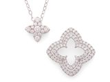 un ensemble composé d'un collier et de boucles d'oreilles en or blanc et diamants