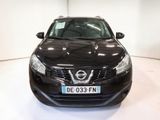 the front of a black nissan rav parked in a white room