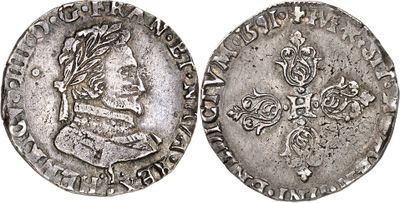 une pièce d'argent portant l'image d'un homme