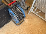 an image of a room with a lot of tools on the floor