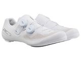 a close up of a pair of white shoes on a white background