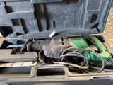 a tool in a case that is sitting on the floor